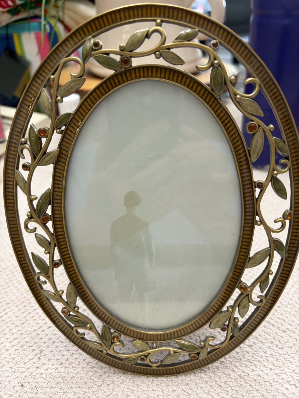 Brass-Tone Oval Frame with Amber Accents